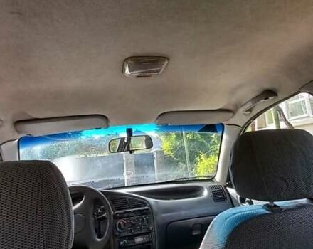 Красный Дэу Сенс, объемом двигателя 1.3 л и пробегом 244 тыс. км за 1900 $, фото 3 на Automoto.ua