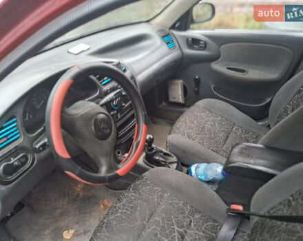 Красный Дэу Сенс, объемом двигателя 1.3 л и пробегом 295 тыс. км за 1550 $, фото 3 на Automoto.ua