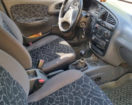 Красный Дэу Сенс, объемом двигателя 1.5 л и пробегом 223 тыс. км за 1700 $, фото 7 на Automoto.ua