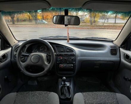 Красный Дэу Сенс, объемом двигателя 1.4 л и пробегом 125 тыс. км за 1400 $, фото 5 на Automoto.ua