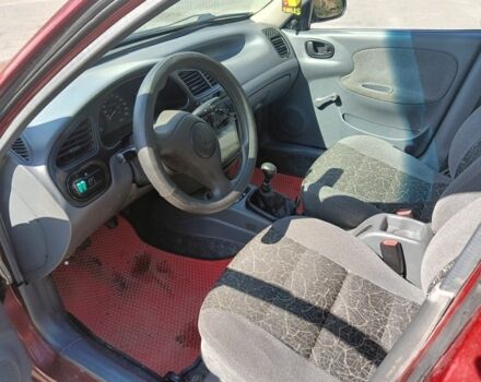Червоний Деу Сенс, об'ємом двигуна 1.3 л та пробігом 226 тис. км за 1456 $, фото 2 на Automoto.ua