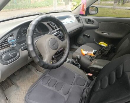 Червоний Деу Сенс, об'ємом двигуна 1.3 л та пробігом 209 тис. км за 1691 $, фото 4 на Automoto.ua