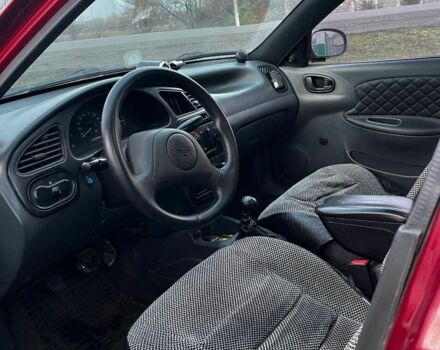 Красный Дэу Сенс, объемом двигателя 1.3 л и пробегом 154 тыс. км за 1499 $, фото 1 на Automoto.ua