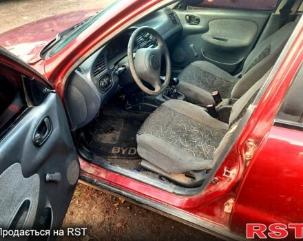 Красный Дэу Сенс, объемом двигателя 1.3 л и пробегом 316 тыс. км за 600 $, фото 6 на Automoto.ua