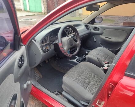 Красный Дэу Сенс, объемом двигателя 1.4 л и пробегом 254 тыс. км за 1500 $, фото 6 на Automoto.ua