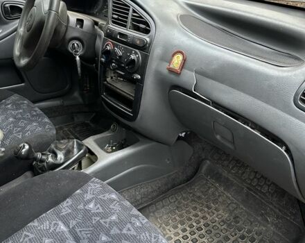 Красный Дэу Сенс, объемом двигателя 1.5 л и пробегом 234 тыс. км за 650 $, фото 7 на Automoto.ua