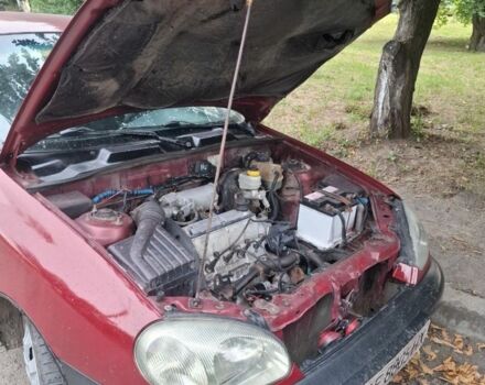 Красный Дэу Сенс, объемом двигателя 1.4 л и пробегом 150 тыс. км за 1500 $, фото 1 на Automoto.ua