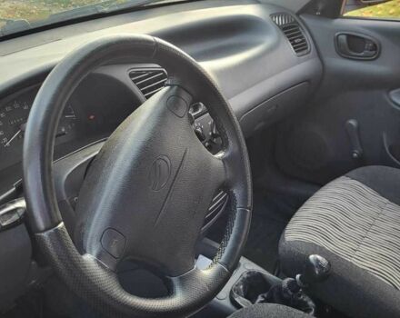 Красный Дэу Сенс, объемом двигателя 1.5 л и пробегом 84 тыс. км за 3550 $, фото 15 на Automoto.ua