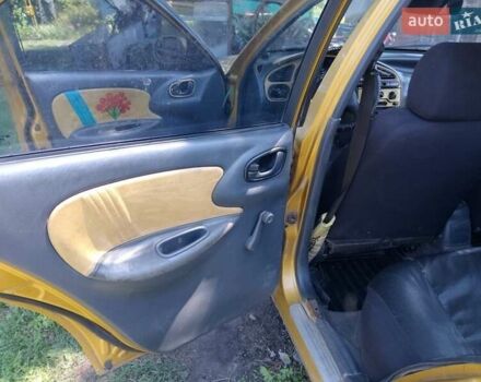 Желтый Дэу Сенс, объемом двигателя 1.3 л и пробегом 281 тыс. км за 1334 $, фото 12 на Automoto.ua