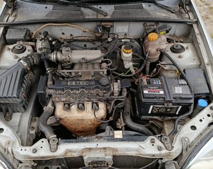 Серый Дэу Сенс, объемом двигателя 1.5 л и пробегом 257 тыс. км за 1999 $, фото 2 на Automoto.ua