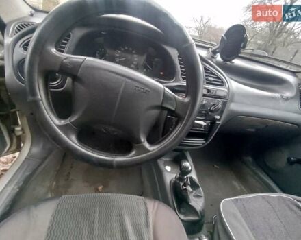 Серый Дэу Сенс, объемом двигателя 1.3 л и пробегом 219 тыс. км за 1654 $, фото 7 на Automoto.ua