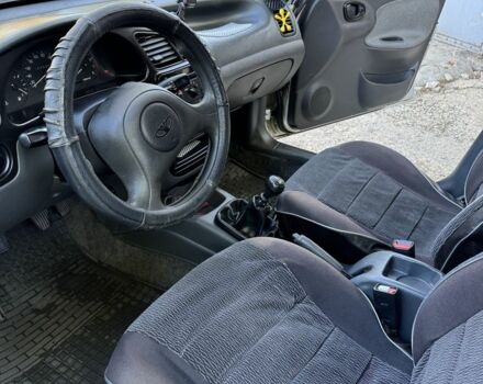 Серый Дэу Сенс, объемом двигателя 1.5 л и пробегом 107 тыс. км за 2000 $, фото 6 на Automoto.ua