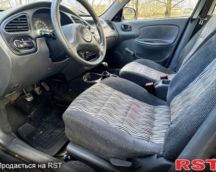 Серый Дэу Сенс, объемом двигателя 1.3 л и пробегом 255 тыс. км за 1900 $, фото 5 на Automoto.ua