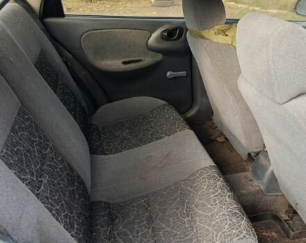 Синий Дэу Сенс, объемом двигателя 1.4 л и пробегом 198 тыс. км за 2000 $, фото 4 на Automoto.ua