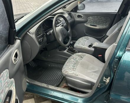 Зелений Деу Сенс, об'ємом двигуна 1.5 л та пробігом 250 тис. км за 1450 $, фото 13 на Automoto.ua