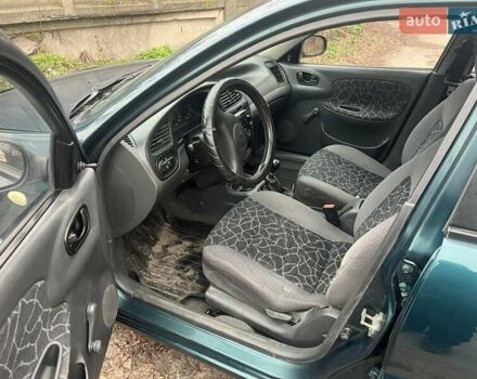 Зеленый Дэу Сенс, объемом двигателя 1.5 л и пробегом 222 тыс. км за 1950 $, фото 6 на Automoto.ua