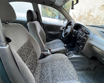 Зелений Деу Сенс, об'ємом двигуна 1.3 л та пробігом 151 тис. км за 2000 $, фото 5 на Automoto.ua