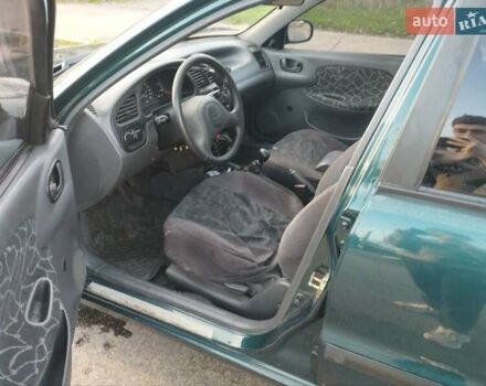 Зеленый Дэу Сенс, объемом двигателя 1.3 л и пробегом 71 тыс. км за 2000 $, фото 9 на Automoto.ua