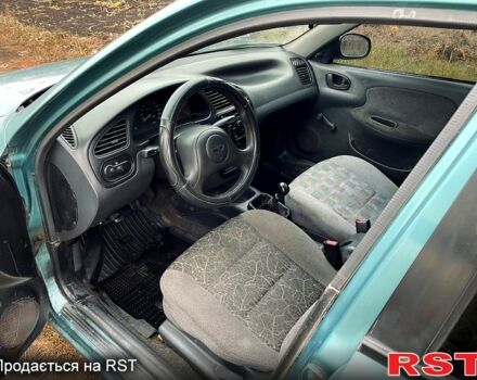 Зеленый Дэу Сенс, объемом двигателя 1.3 л и пробегом 166 тыс. км за 1299 $, фото 4 на Automoto.ua