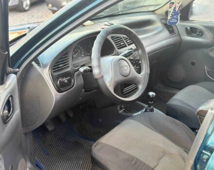 Зеленый Дэу Сенс, объемом двигателя 1.5 л и пробегом 330 тыс. км за 1700 $, фото 4 на Automoto.ua