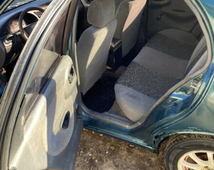 Зеленый Дэу Сенс, объемом двигателя 1.3 л и пробегом 267 тыс. км за 900 $, фото 7 на Automoto.ua