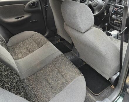 Зелений Деу Сенс, об'ємом двигуна 1.3 л та пробігом 204 тис. км за 1000 $, фото 7 на Automoto.ua