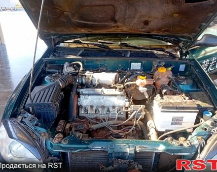 Деу Сенс 2005 у Кривому Розі на Automoto.ua Зелений Деу Сенс, об'ємом двигуна 1.3 л та пробігом 150 тис. км за 2000 $, фото 10 на Automoto.ua