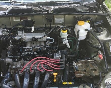 Зеленый Дэу Сенс, объемом двигателя 2 л и пробегом 154 тыс. км за 2400 $, фото 1 на Automoto.ua