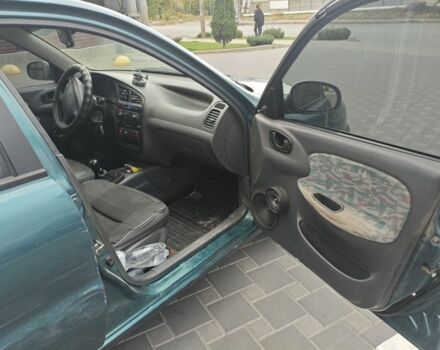 Зелений Деу Сенс, об'ємом двигуна 1.5 л та пробігом 430 тис. км за 1800 $, фото 5 на Automoto.ua