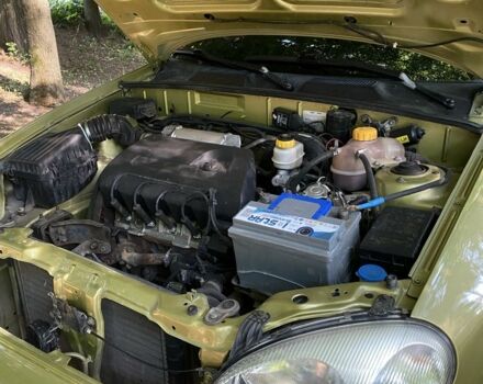 Зеленый Дэу Сенс, объемом двигателя 1.4 л и пробегом 153 тыс. км за 2000 $, фото 7 на Automoto.ua