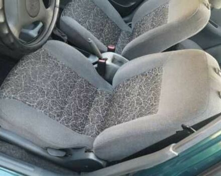 Зеленый Дэу Сенс, объемом двигателя 1.4 л и пробегом 132 тыс. км за 3000 $, фото 5 на Automoto.ua