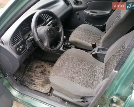 Зелений Деу Сенс, об'ємом двигуна 1.3 л та пробігом 98 тис. км за 1599 $, фото 12 на Automoto.ua