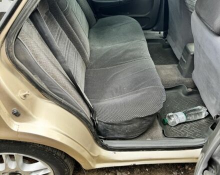 Бежевый Дэу Winstorm, объемом двигателя 2 л и пробегом 280 тыс. км за 1300 $, фото 6 на Automoto.ua