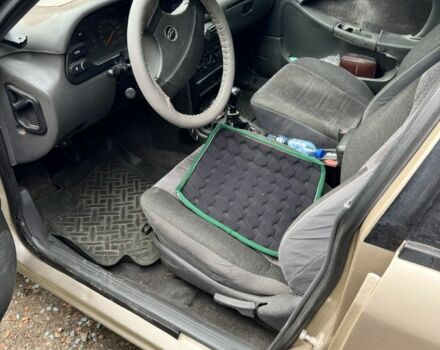 Бежевый Дэу Winstorm, объемом двигателя 2 л и пробегом 280 тыс. км за 1300 $, фото 7 на Automoto.ua