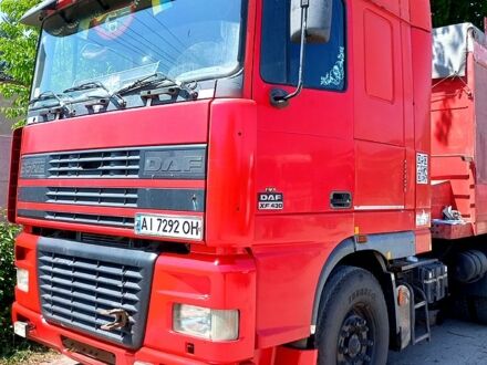 Даф XF 2000 у Києві на Automoto.ua Червоний Даф XF, об'ємом двигуна 12 л та пробігом 800 тис. км за 7500 $, фото 1 на Automoto.ua