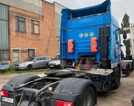 Синий Даф XF 105, объемом двигателя 12.9 л и пробегом 875 тыс. км за 15000 $, фото 2 на Automoto.ua