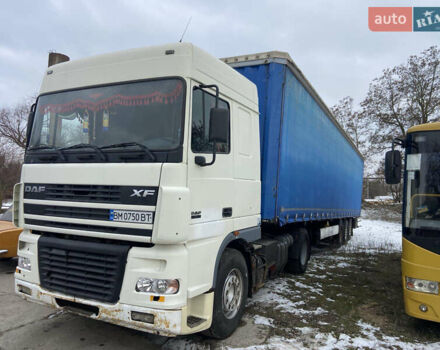 Белый Даф XF 95, объемом двигателя 12.58 л и пробегом 100 тыс. км за 11000 $, фото 1 на Automoto.ua