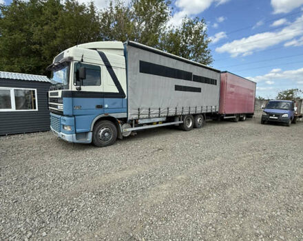 Синий Даф XF 95, объемом двигателя 12.6 л и пробегом 305 тыс. км за 18500 $, фото 2 на Automoto.ua