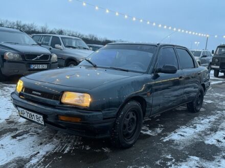 Зелений Дайхатсу Applause, об'ємом двигуна 0 л та пробігом 250 тис. км за 1000 $, фото 1 на Automoto.ua