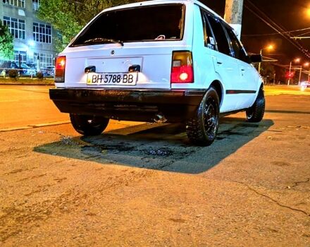 Белый Дайхатсу Шарада, объемом двигателя 1 л и пробегом 400 тыс. км за 550 $, фото 2 на Automoto.ua