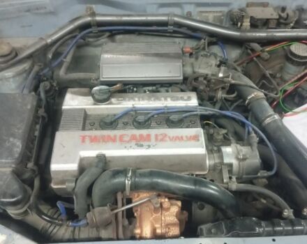 Черный Дайхатсу Шарада, объемом двигателя 1 л и пробегом 200 тыс. км за 239 $, фото 1 на Automoto.ua