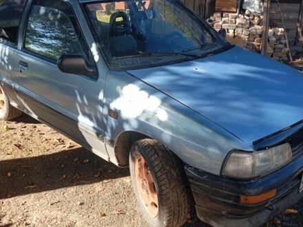 Черный Дайхатсу Шарада, объемом двигателя 1 л и пробегом 200 тыс. км за 239 $, фото 1 на Automoto.ua