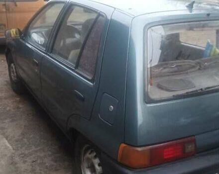 Сірий Дайхатсу Charade, об'ємом двигуна 1 л та пробігом 218 тис. км за 1500 $, фото 3 на Automoto.ua