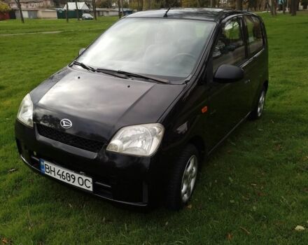 Черный Дайхатсу Куоре, объемом двигателя 1 л и пробегом 122 тыс. км за 3500 $, фото 1 на Automoto.ua