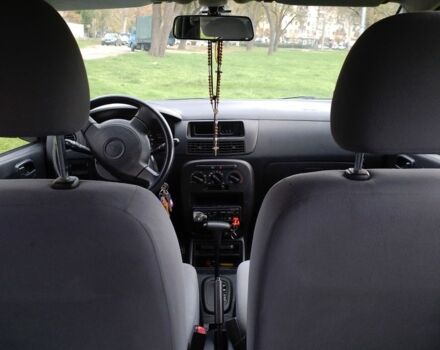 Черный Дайхатсу Куоре, объемом двигателя 1 л и пробегом 122 тыс. км за 3500 $, фото 3 на Automoto.ua