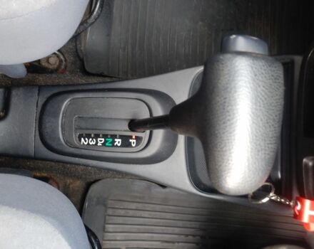 Черный Дайхатсу Куоре, объемом двигателя 1 л и пробегом 122 тыс. км за 3500 $, фото 5 на Automoto.ua