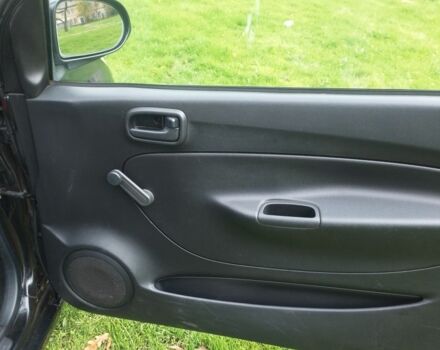 Черный Дайхатсу Куоре, объемом двигателя 1 л и пробегом 122 тыс. км за 3500 $, фото 6 на Automoto.ua