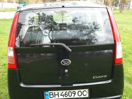 Черный Дайхатсу Куоре, объемом двигателя 1 л и пробегом 122 тыс. км за 3500 $, фото 1 на Automoto.ua