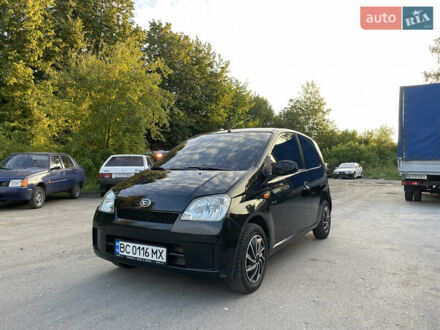 Дайхатсу Куоре 2004 в Тульчине на Automoto.ua Черный Дайхатсу Куоре, объемом двигателя 0.99 л и пробегом 185 тыс. км за 3200 $, фото 1 на Automoto.ua