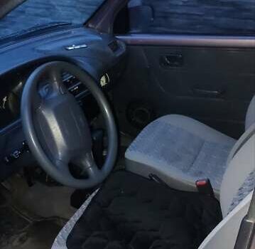 Фиолетовый Дайхатсу Куоре, объемом двигателя 0.85 л и пробегом 155 тыс. км за 2000 $, фото 5 на Automoto.ua